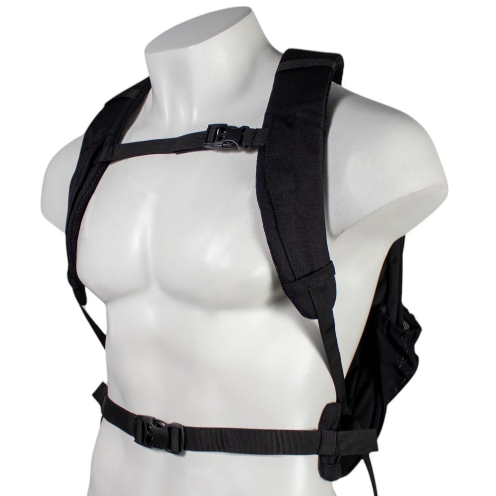 Black backpack buckled onto a white mannequin.