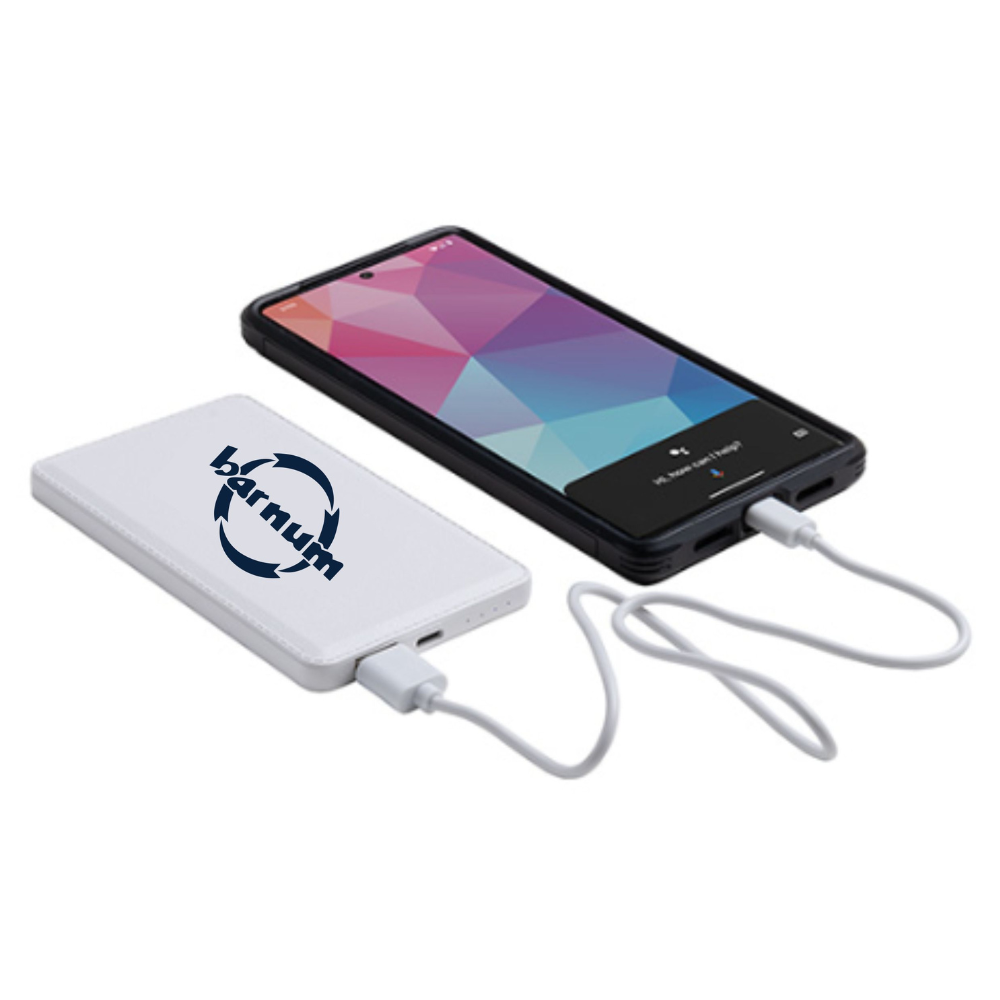 White power bank with 'barnum' logo charging a smartphone.