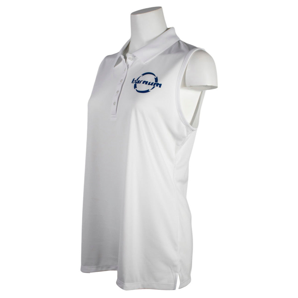 Side of a white sleeveless polo shirt with a navy barnum logo on the chest.