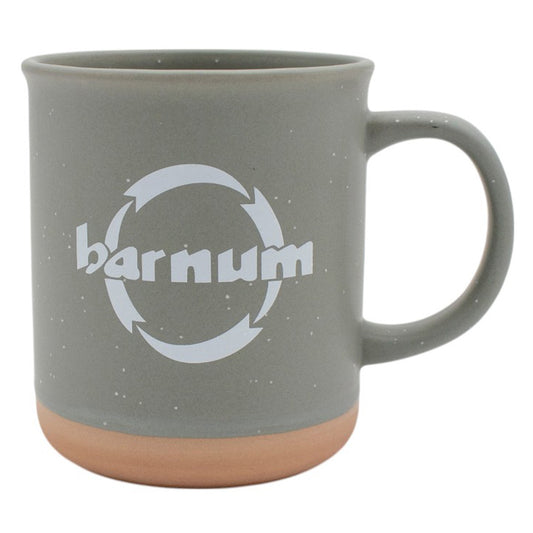 Gray mug with 'Barnum' logo across the front and a tan bottom. 