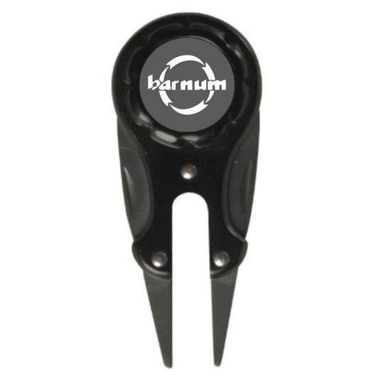 Black golf divot tool with 'barnum' logo.