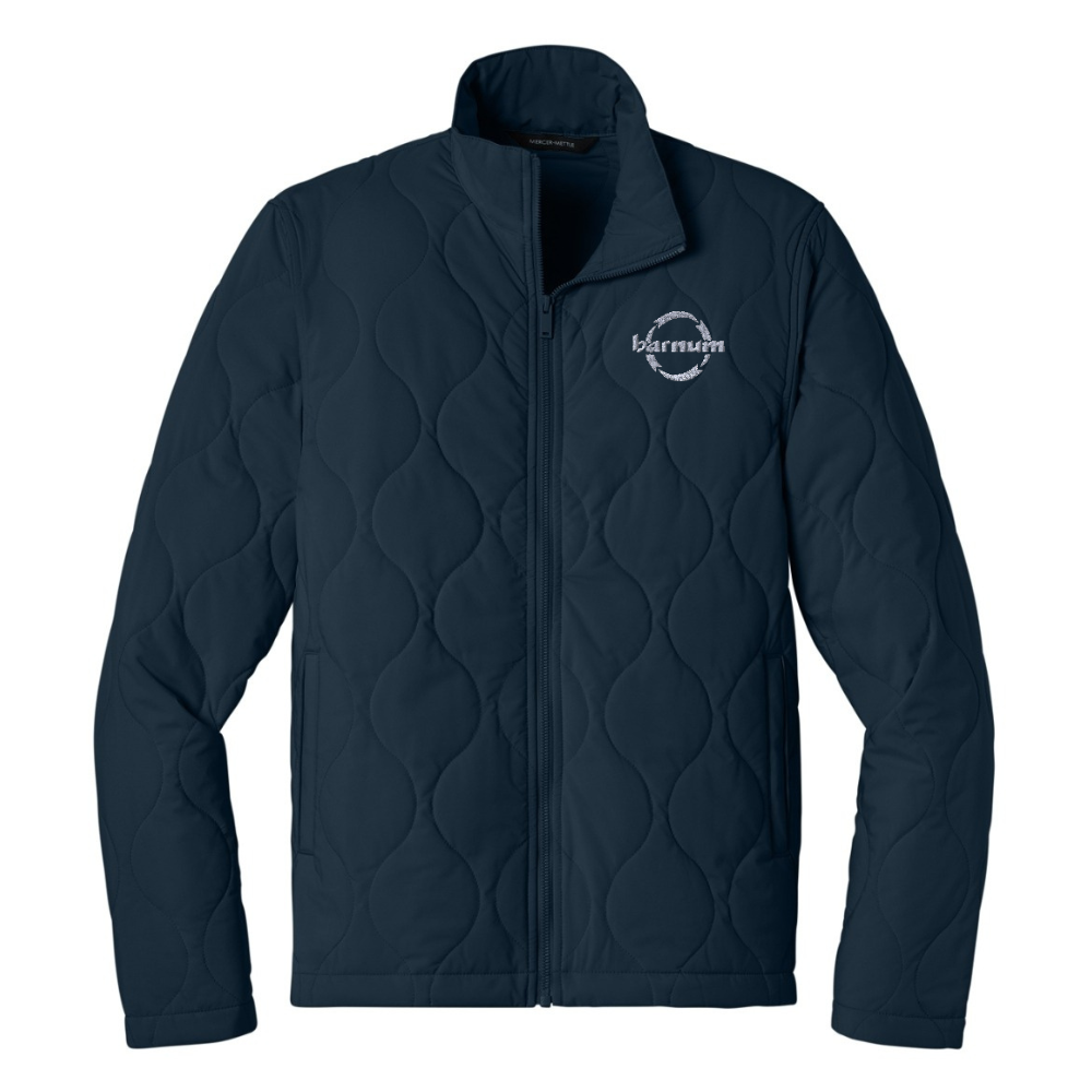 Navy quilted jacket with a white barnum logo on the left chest.